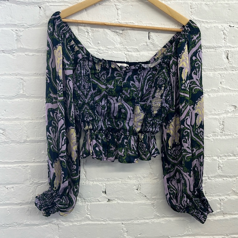 Peplum top with ruched corset waist